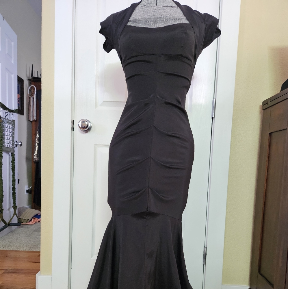 Betsy and Adam Long formal. Material is an extremely stretchy crisp chiffon type